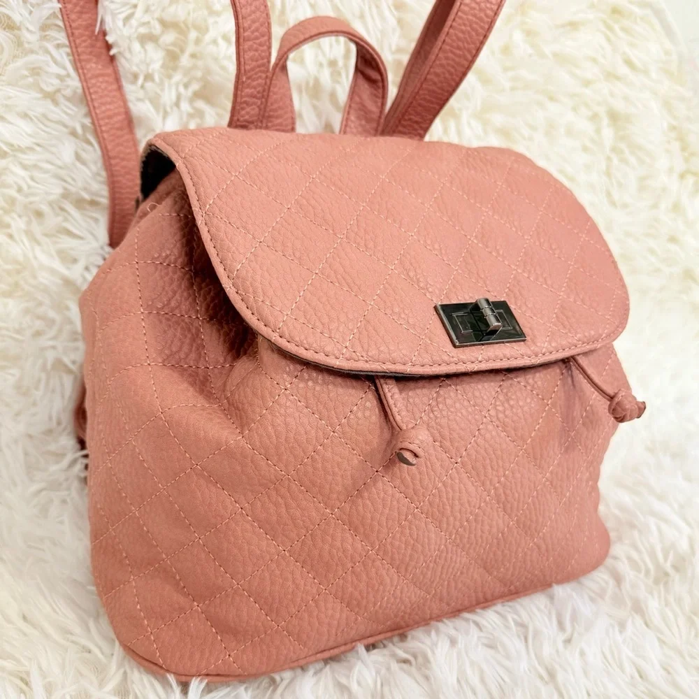 Daryll Quilted Faux leather drawstring bucket backpack purse blush|nude JustFab